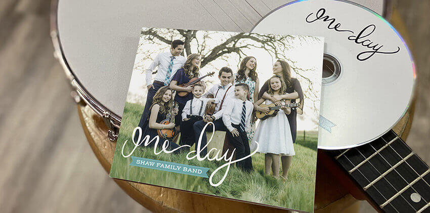 CD digipak printing of CD cover with an image of a family and the text “Shaw Family Band”